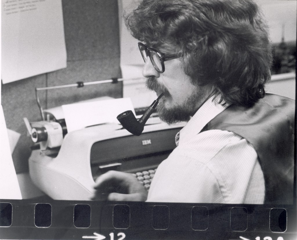 Ojārs Kalniņš at typewriter
